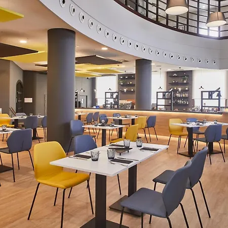 Отель Silken Amara Plaza